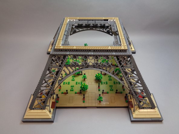 Before beginning installation of your lamp posts, make sure to disconnect all control wires between sections of your Eiffel Tower, and remove the top two sections.