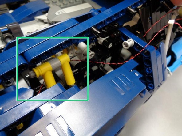 Route the Pico LED cable through the small hole above the turn signal assembly as shown by the green circle in the second photo.