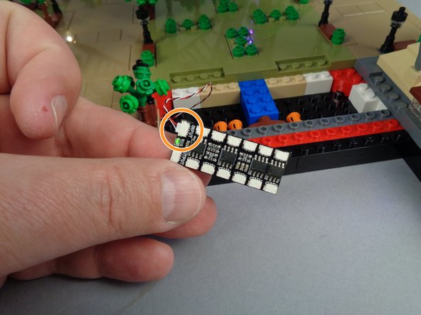 Take another BRANCH12X driver board from your kit bag, and connect the control cable you routed earlier to the INPUT plug on the BRANCH12X as shown in the photo for this step.