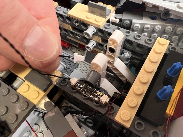 There should be a wire connected to the &quot;OUT&quot; plug on the magnetic switch circuit board (see the first photo for this step).