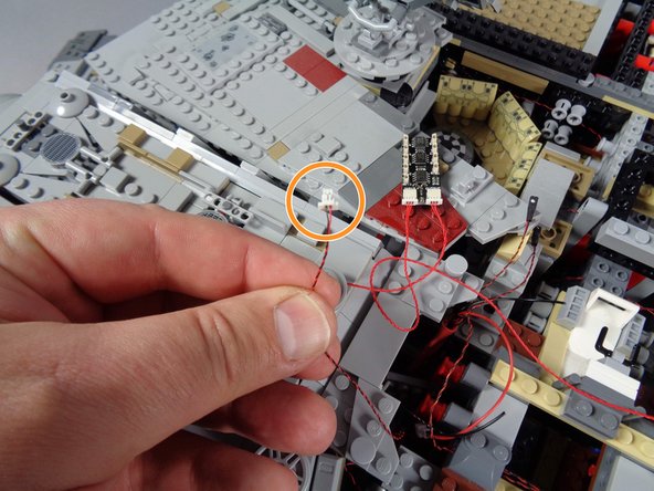 Connect the other end of the cable you just plugged into the BRANCH09X adapter to one of the plugs on this BRANCH13 adapter, as shown in the first photo.