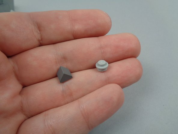 The LEGO parts for this step are taken from the extra parts provided in your original LEGO set.  They are not included with your light kit.