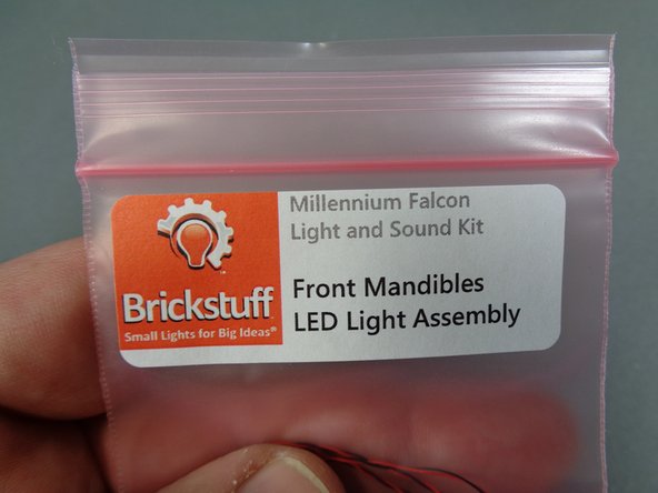 As shown in the second photo, disassemble the mandible parts.