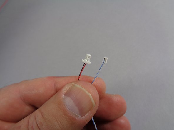 These cables have a large plug on one end and a small plug on the other end.  See the second photo for the size comparison close up.
