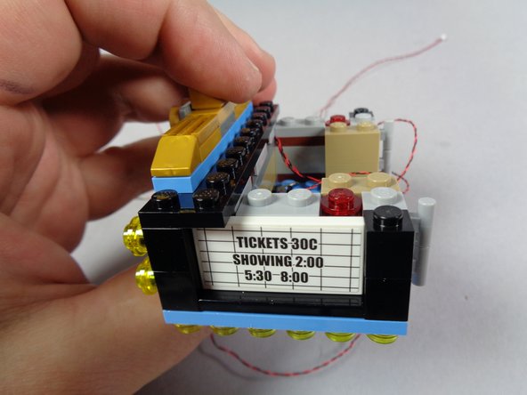 Because of the small gap behind the tiles, the light wires for the four front lights should be completely hidden.