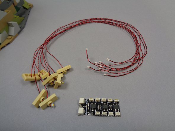 Carefully remove the parts from Bag 7, making sure not to tangle any wires (or to carefully un-tangle any wires that may have become tangled).