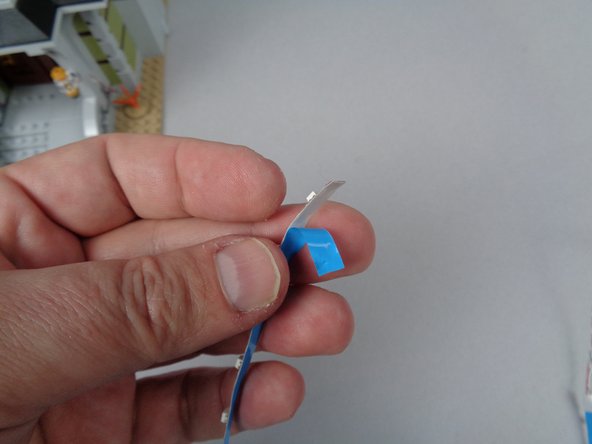 The backing shown in these photos is blue, but your light strips may have a different color backing.