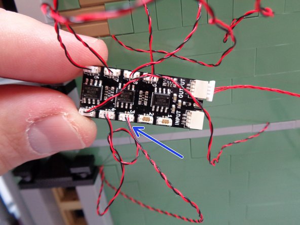 As shown by the blue arrow in the second photo, connect the warm white kitchen light wire to plug #3 on the BRANCH09X adapter board.