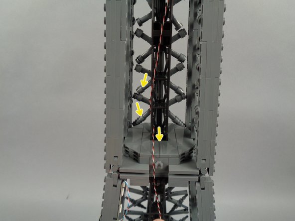 As shown in the third photo, the wire should be just long enough to reach the bottom of the top section.