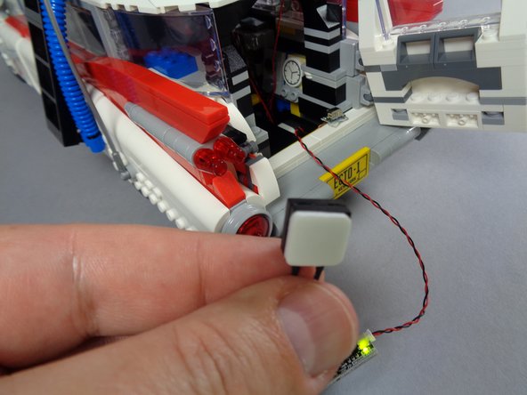 You may choose to mount the pushbutton power switch for your LiPo power supply underneath your Ecto-1 for easy access.