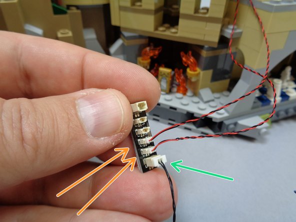 There should be a 24&quot; 2-wire connecting cable inside Bag 9.  Take the cable and connect it to one of the large connectors on the BRANCH15 adapter board as shown by the green arrow in the third photo.