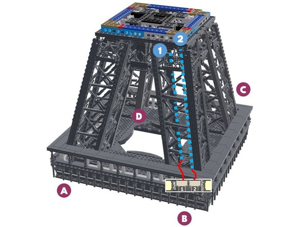 Next, you will rotate your Eiffel tower in a clockwise direction-- this is the same direction the loose control cable from the previous step is pointing toward.