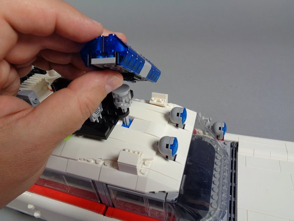 As shown in the first and second photos, next you will carefully remove the front and rear lightbars.