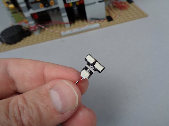 As shown in the second photo for this step, you will also have a &quot;Y&quot; shaped adapter board in your BOX #3, labeled BRANCH05X on the back.  Connect one end of the 3-wire cable to the plug labeled &quot;IN&quot; on the BRANCH05X adapter board.