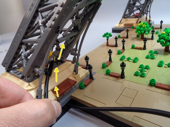 If possible, have someone else help support the base as you flip it over.