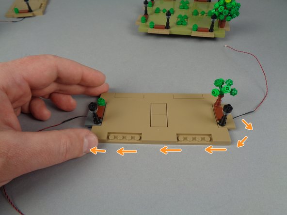 Next you will re-attach Panel 1L to the base of your Eiffel Tower.