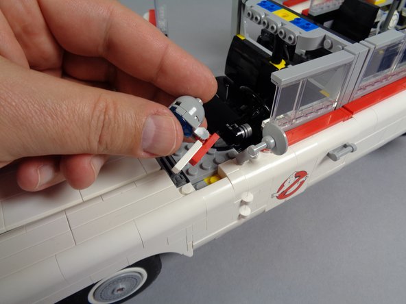 Next you will mount another blue LED light inside the hood spot light.  Doing this now, while you have the roof removed, makes installation easier.