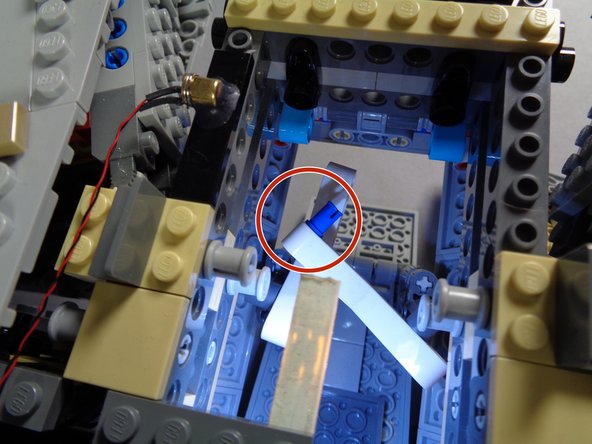 Repeat the same procedure for the other boarding ramp arm as shown in the first photo.