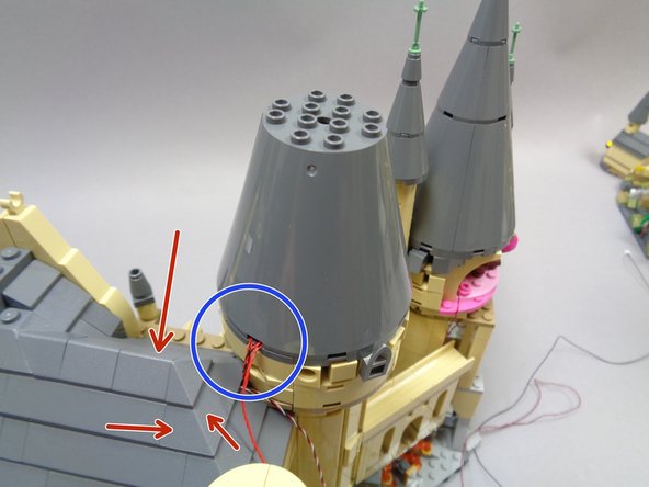 Now you can finish re-assembling the tower by attaching the rear half-cone to conceal the wires and the BRANCH09 adapter board.