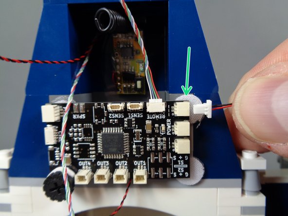 The plug will fit only one way.  Do not force.  Use your fingernail to press the plug in.  You will feel a soft &quot;click&quot; when the plug is inserted all the way.