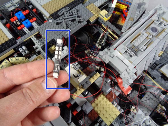As shown in the first photo for this step, the final adapter board in your chain should be the BRANCH09, which has three small plugs (instead of the nine small plugs on the BRANCH09X).