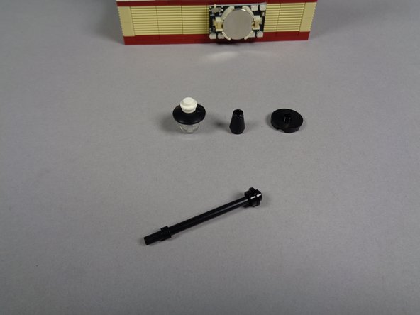 Remove/separate the lamp post pieces as shown in the second photo.