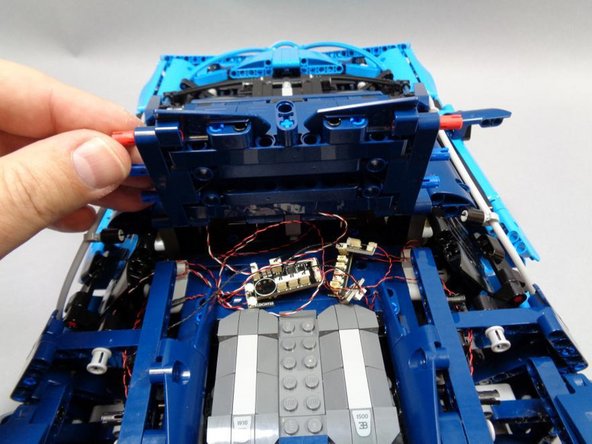 You should now have all lights, wires, and adapter boards mounted and secured.  The first photo shows the jumble of wires and boards-- it may look messy, but everything should still fit in the space under the roof when it is closed.