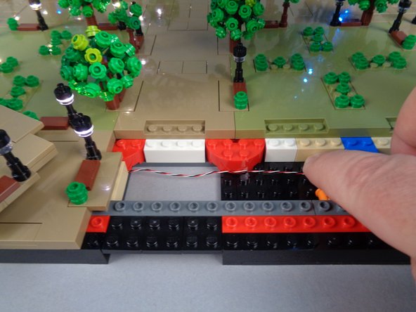 Make sure the control cable passes between, not on top of, any studs.