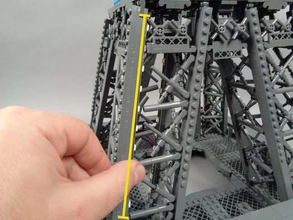 As shown by the red circle in the first photo for this step, remove the small piece that supports the horizontal walkway.  This needs to be removed to make room for the light strip.