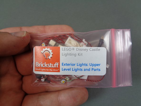 For these next steps, you will use parts from the bag labeled &quot;Upper Level Lights and Parts,&quot; which is inside the Exterior Lights box.