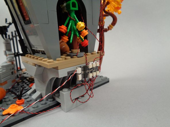 Make sure no light wires are stuck to the sticky square before attaching the BRANCH06X driver board.