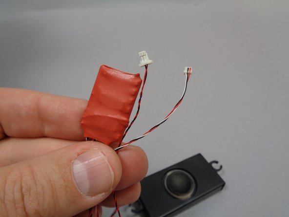 Remove the sound module from Bag 3.  As shown in the first photo, the sound module has two wires: one red/black power wire with a large plug and one red/white/black cable control wire with a small connector.