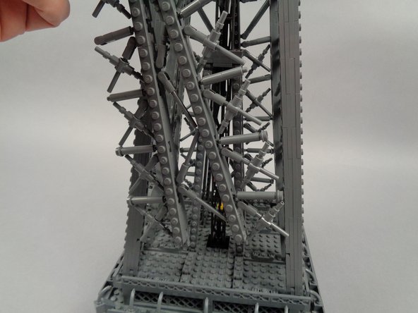 As shown in the third photo for this step, you should now be able to fully remove the rear panel.