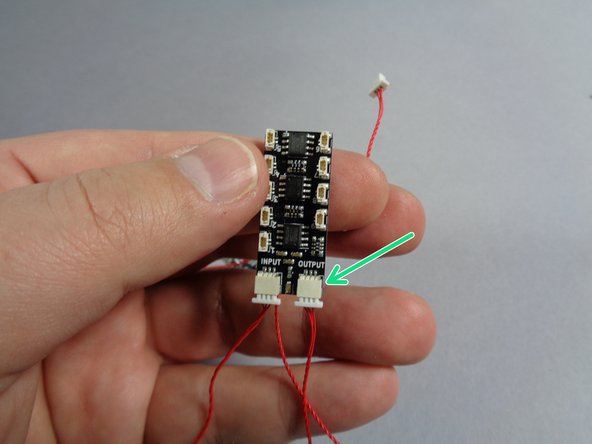 In order for your kit to function correctly, it is critical that you connect the INPUT and OUTPUT plugs as shown, so that the OUTPUT from one adapter is connected to the INPUT on the next.  If you connect an OUTPUT to an OUTPUT or an INPUT to an INPUT, the green power light will still turn on, but the connected lights will not work.