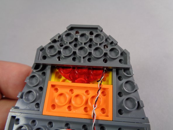 The eye assembly is extremely fragile-- do not disassemble it!  The parts have been glued together and the LED lights inside have been aligned and tested.  Excessive handling of the eye section will damage the electronics inside. A damaged eye section cannot be repaired.