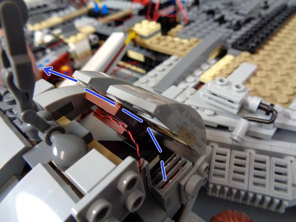 The dotted blue line in the third photos shows the direction the light wire should run.