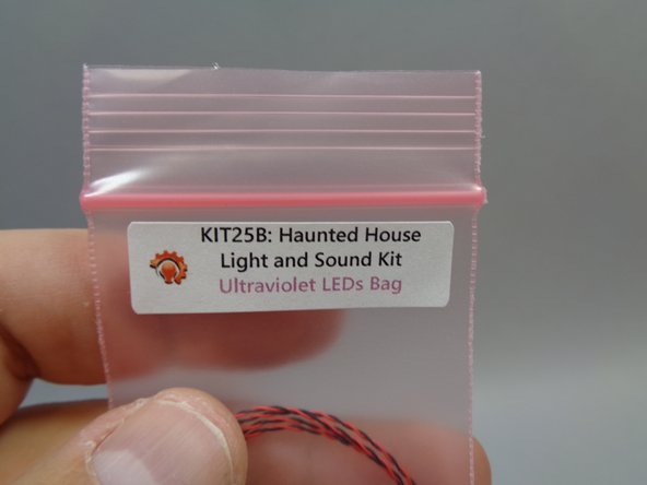 Your kit includes two ultraviolet lights that can be used to make the two ghosts in the Haunted House glow in the dark.