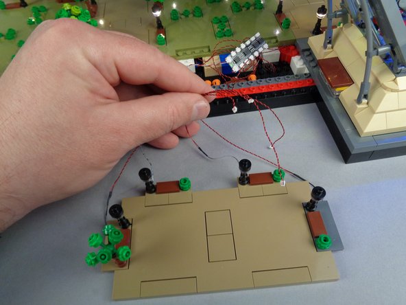 Next you will re-attach Panel 2F.