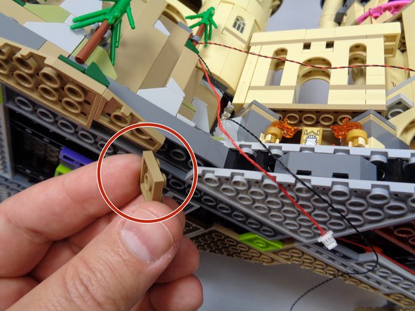 You will now run the red control wire under the castle base.