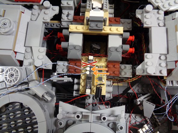 The second and third photos show how to connect the laser light wires for two different versions of BRANCH09 adapter (photo 2 shows an adapter with top-facing connectors and photo 3 shows an adapter with side-facing connectors).  Follow the photo with the BRANCH09 adapter that matches the one included with your kit.