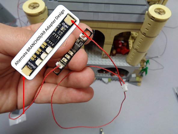 Depending on when your kit was manufactured, your BRANCH09 adapter board may have top-facing or side-facing connectors.  The two designs operate identically.