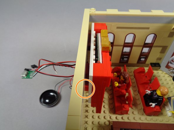 The orange circle in the third photo shows how the frame will sit against the wall, with the two 1x4 plates providing a gap for the wires to pass.