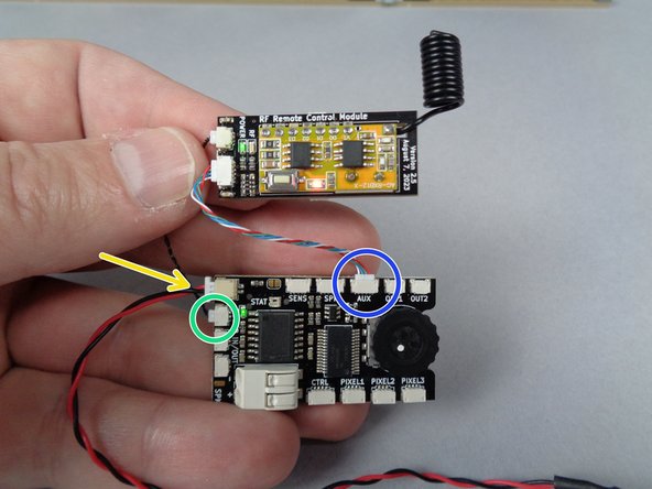 As shown in the first photo for this step, connect the other ends of the connecting cables to plugs on the main effect controller: