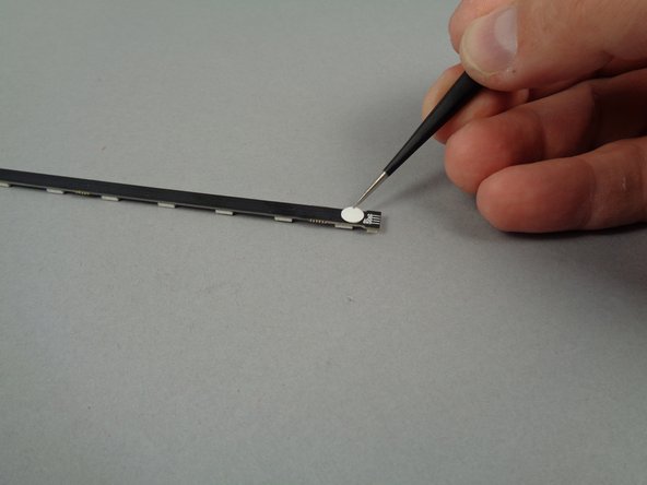 In Step 23, you opened the bag of 13-LED light strips, and you used eight of these for the lower tower level.  You will use the remaining eight strips from this bag for the middle level.