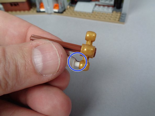 For proper installation of the candles, it is critical that you leave the extra wire on the bottom of the candle as shown in the second photo.  If your candle is damaged during installation, it cannot be repaired.