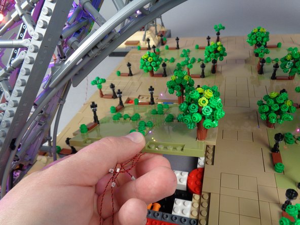 Next, you will re-attach the large Panel 1 section, being careful to make sure all wires are free from pinching and pulling.