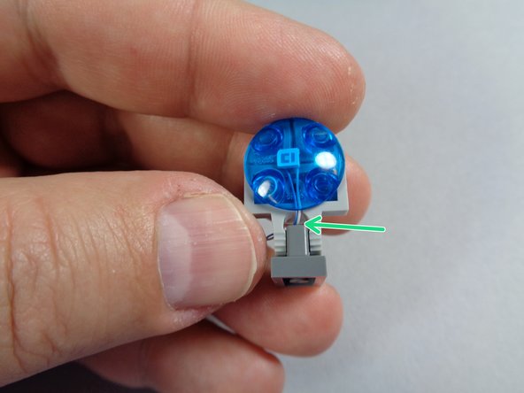 it is important to make sure the wire passes between the two clip pieces so it does not get caught or pinched.