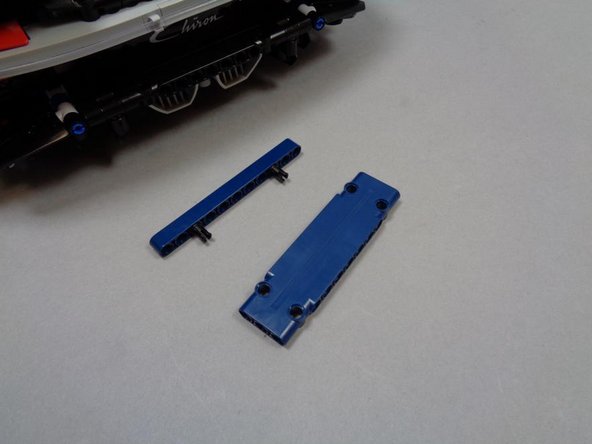 If you don't have the spoiler add-on kit, you can move to Step 45 to see how the remote control works.