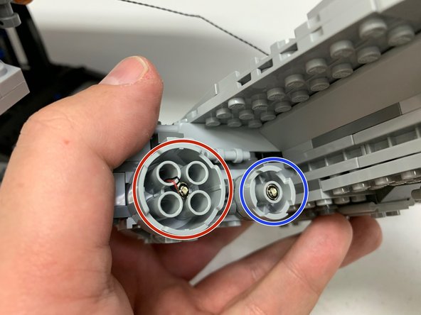 Carefully remove the rear center engine assembly.  This is the section that has seven engines.