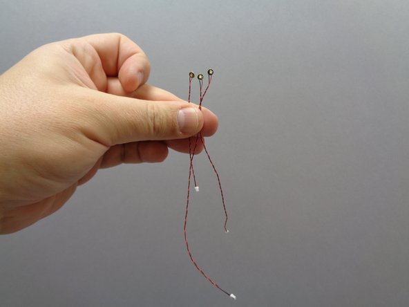 The second photo shows the different lengths of wire for the green lights.